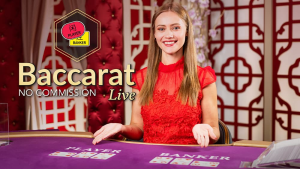 ภาพโต๊ะบาคาร่าแบบไม่มีค่าคอมมิชชั่น มีไพ่บาคาร่า ชิปเดิมพัน และข้อความ Baccarat No Commission Live ในบรรยากาศคาสิโนออนไลน์หรูหรา