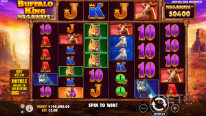 ภาพหน้าจอเกม Buffalo King Megaways แสดงวงล้อสล็อตและสัญลักษณ์ต่างๆ ในเกม